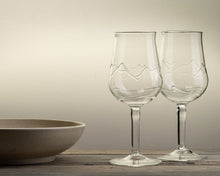 Load image into Gallery viewer, Handblown wine glass with mountain design