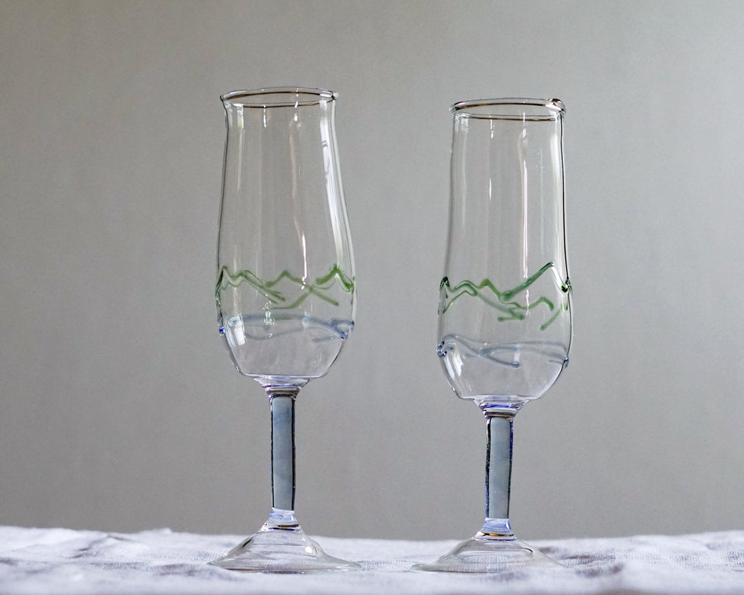 Pair of coloured-line mountain champagne glasses, pair A